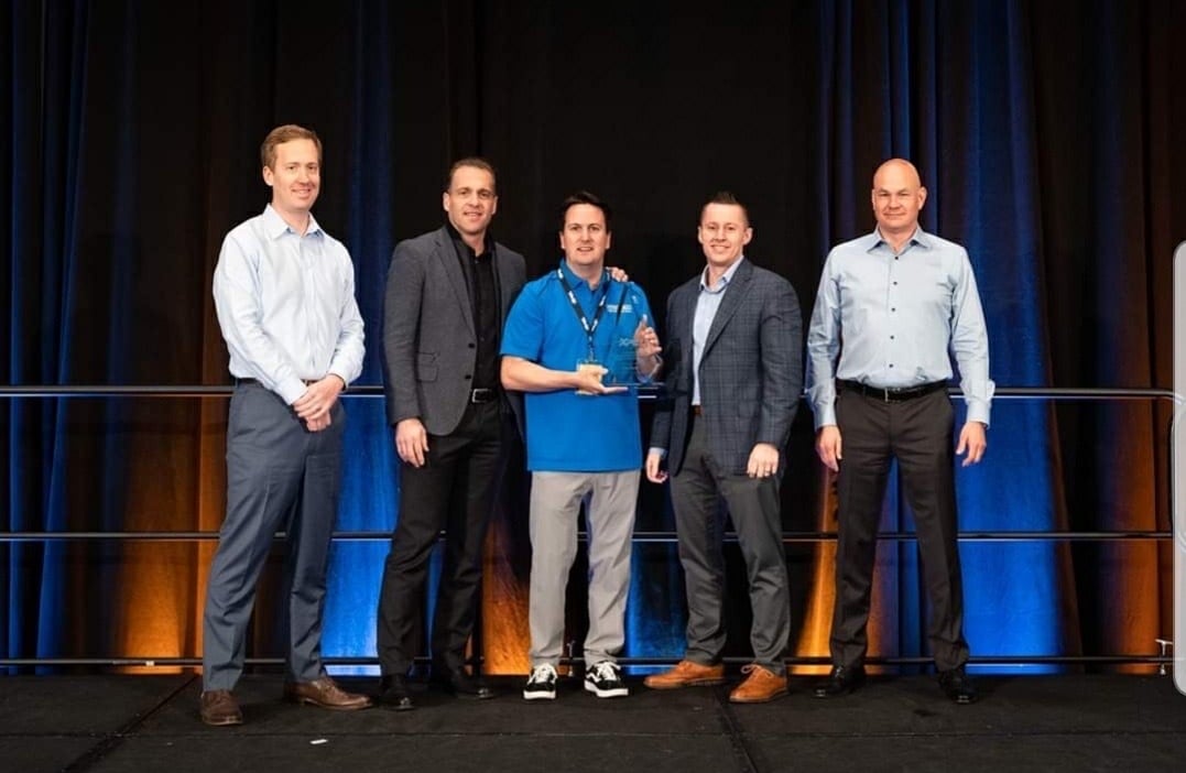 Richard accepting the Canadian Paint Protection award with XPEL Company Leaders